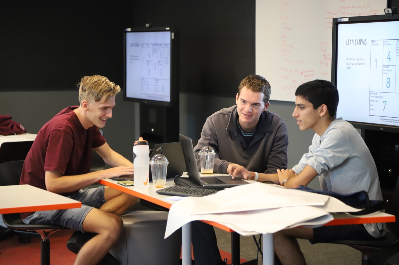 St Andrew’s men working together at Androvation, the College’s annual hackathon.