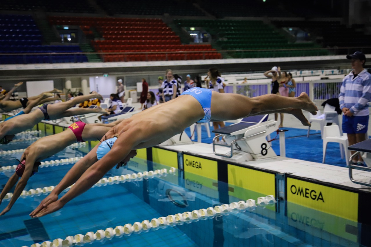 Sydney University residential colleges competing in the annual men’s Rawson Swimming Competition at Sydney Olympic Park Aquatic Centre.